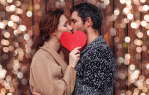 boyfriend,and,girlfriend,kisisng,behind
