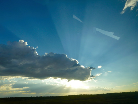 The Sun's Rays Showing Around Clouds