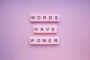 words,have,power,,on,a,pink,background