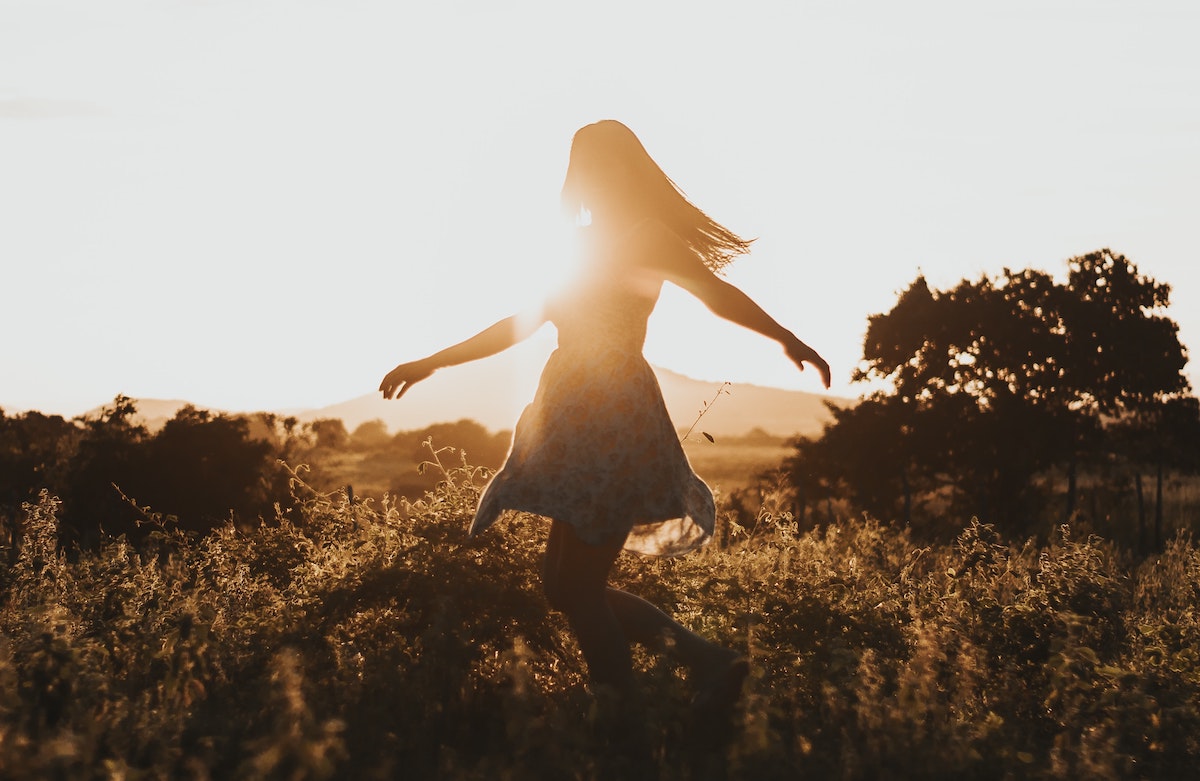 Woman Turning Around On Green Fields 2868441